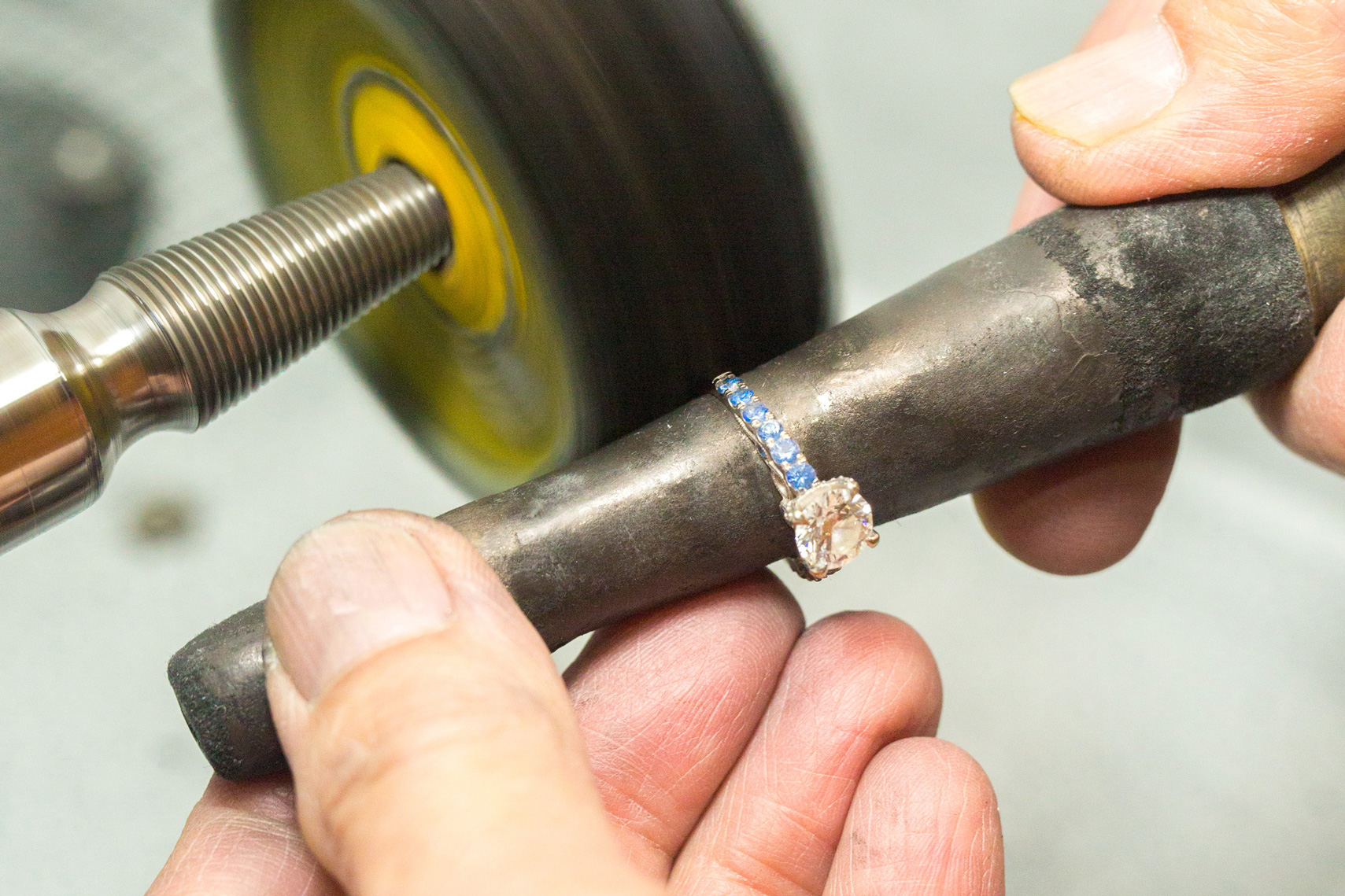 Market Street Diamonds jeweler polishing a customer's engagement ring