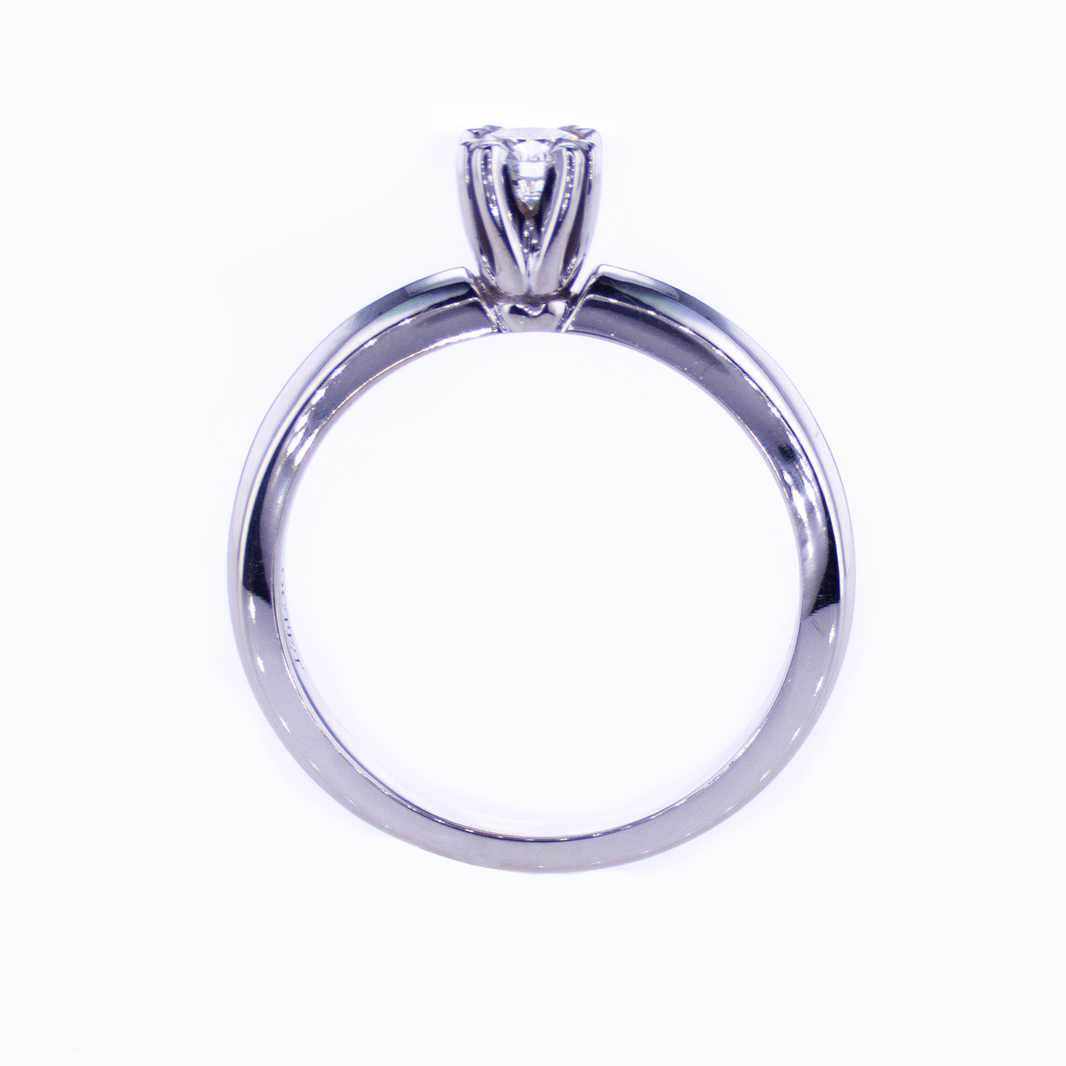 Classic Four-prong Solitaire Engagement Ring and Diamond