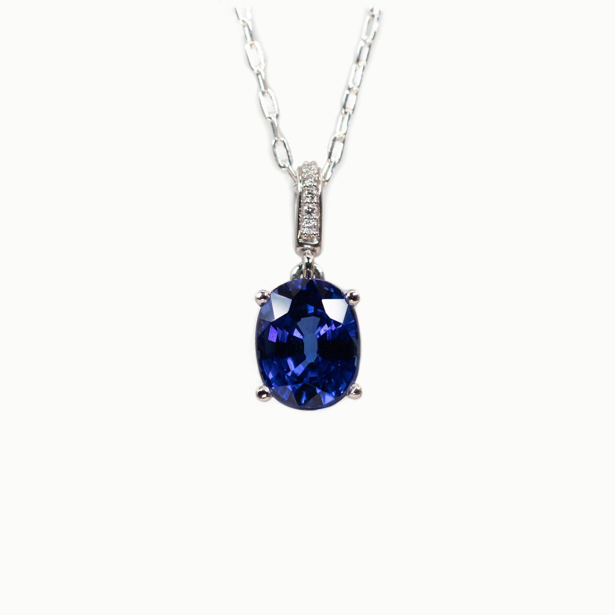 Lab-grown Oval Blue Sapphire Pendant with Diamond Accents