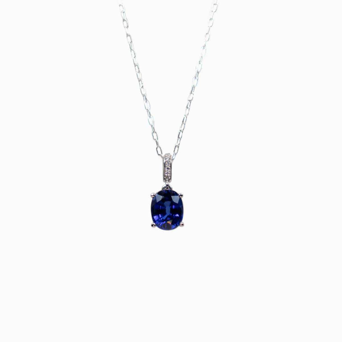 Lab-grown Oval Blue Sapphire Pendant with Diamond Accents