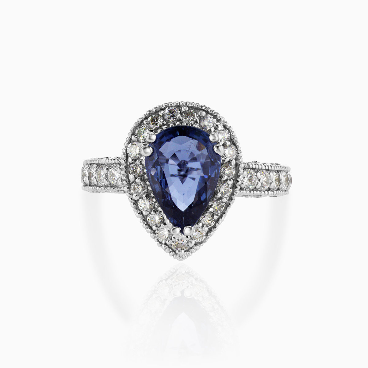 Pear-shaped Natural Blue Sapphire and Diamond Halo Engagement Ring