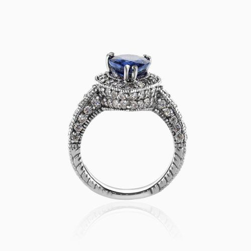 Pear-shaped Natural Blue Sapphire and Diamond Halo Engagement Ring